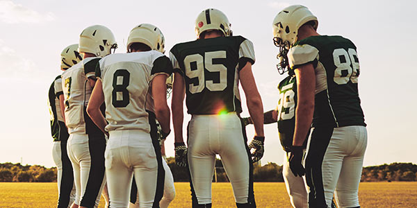 football team huddling